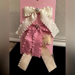 Set of 3 hair bows with ruffled edges and crystal heart in bow center.  NWT